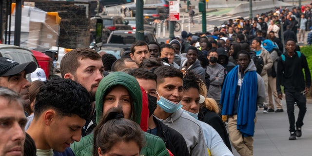 Massive line of migrants in New York City