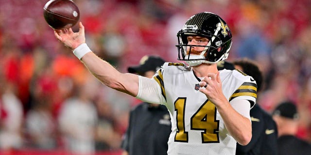 Andy Dalton warms up