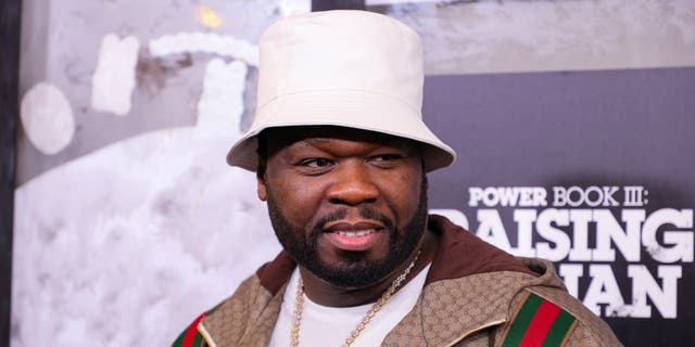 50 Cent wearing white hat