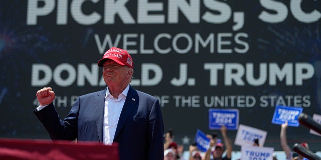 Trump on stage at a rally