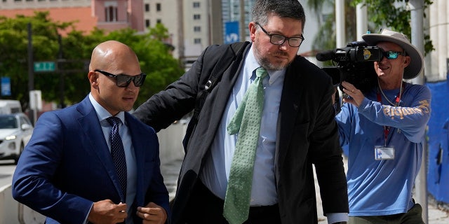 Trump aide Walt Nauta pleads not guilty in classified documents case after multiple hearing delays 2 Nauta and attorney in Miami court