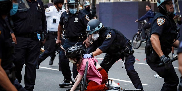 A protester on a bike