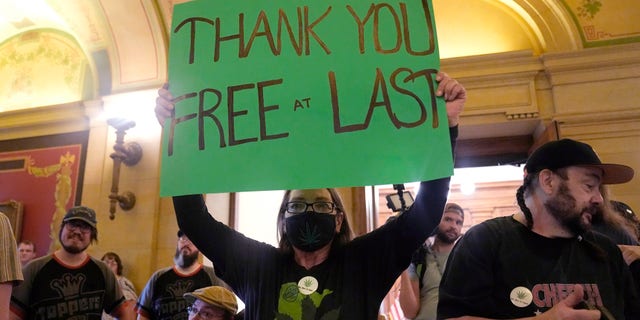 Activist holding sign