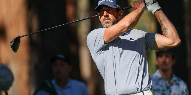 Aaron Rodgers golfs in California