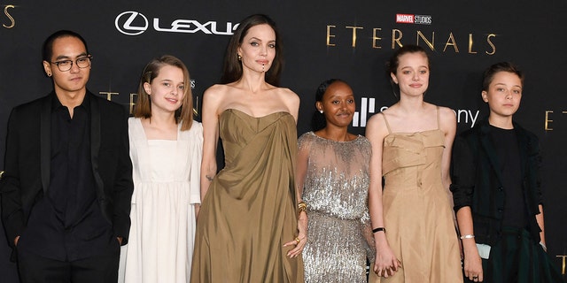 Angelina Jolie and her kids at a red carpet
