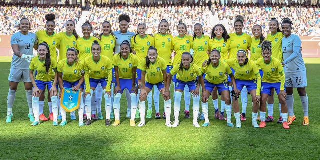 The Brazilian women's soccer team poses for a photo