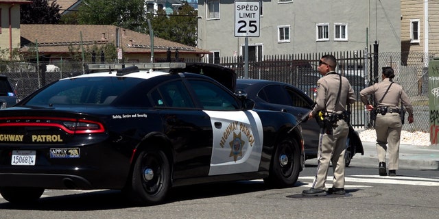 Armed California Highway Patrol officers respond to call armed with guns dranw