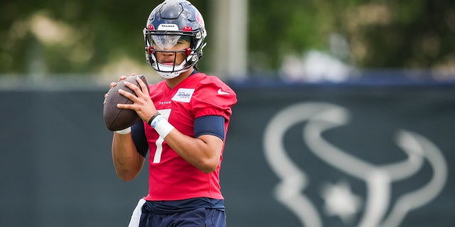 C.J. Stroud throws during rookie mini camp