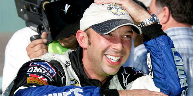 Chad Knaus grins