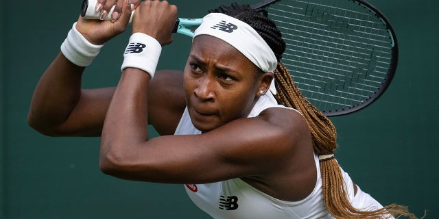 Coco Gauff swings racket