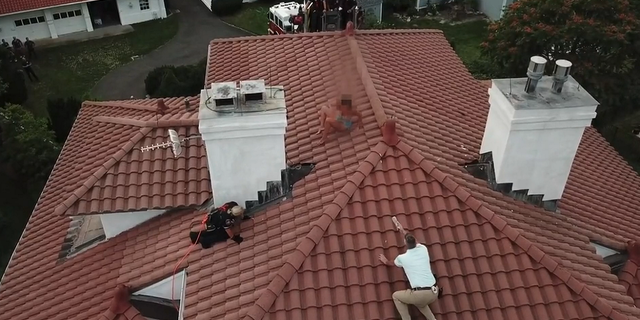 Connecticut arrest on home's roof