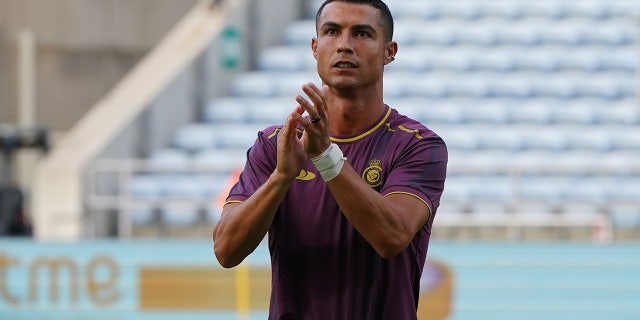 Cristiano Ronaldo warms up