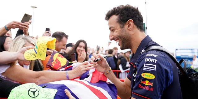 Daniel Ricciardo signing autographs