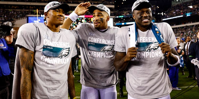 DeVonta Smith, Jalen Hurts and AJ Brown celebrate win