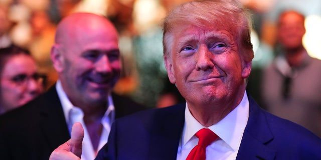 Donald Trump with thumbs up at UFC 290