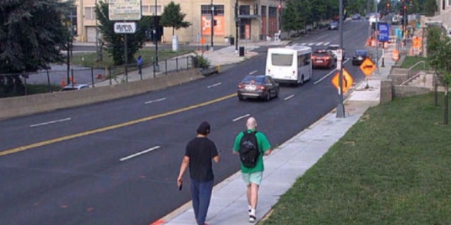 Jaime Macedo, suspect, seen walking behind shooting victim on CUA campus