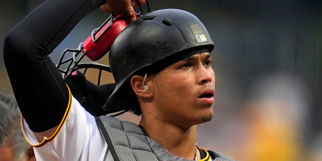 Endy Rodriguez takes off mask