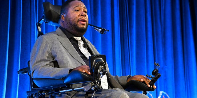 Eric LeGrand speaks on stage