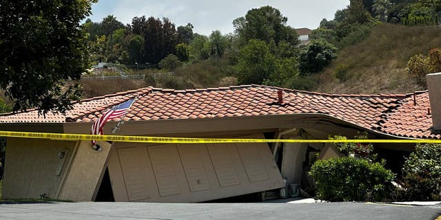 Tape blocking outside of Rolling Hills Estates home