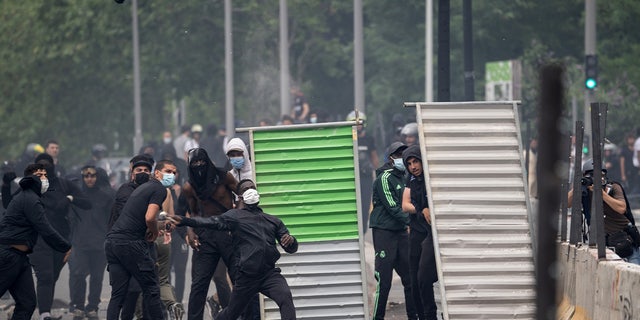 French rioters clashing with police