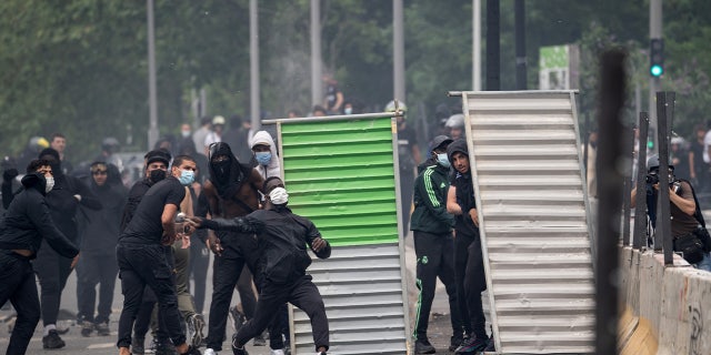 French rioters clashing with police