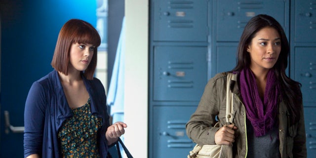 Lindsey Shaw and Shay Mitchell in a scene from Pretty Little Liars