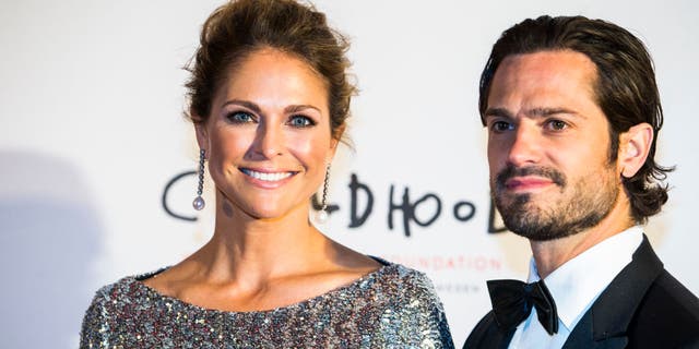 prince carl and princess madeleine of sweden on red carpet