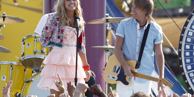 Miley Cyrus in the movie Hannah Montana