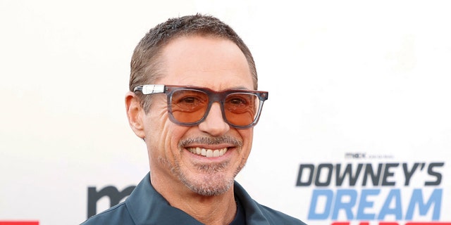 Robert Downey Jr. wearing sunglasses on the red carpet