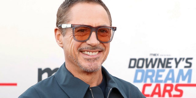 Robert Downey Jr. wearing sunglasses on the red carpet