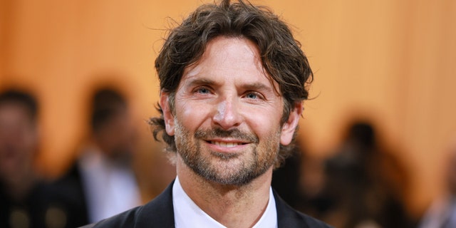 Bradley Cooper at the Met Gala soft smiles