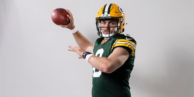 Sean Clifford poses for a photo as a Green Bay Packer