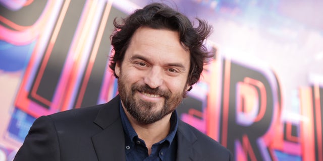 Jack Johnson with a beard on the Spider-Verse red carpet
