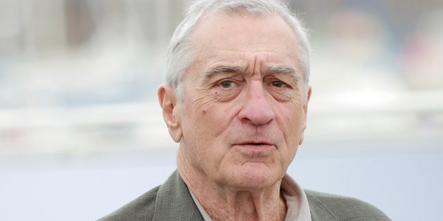 Robert De Niro looks serious on the carpet in Cannes
