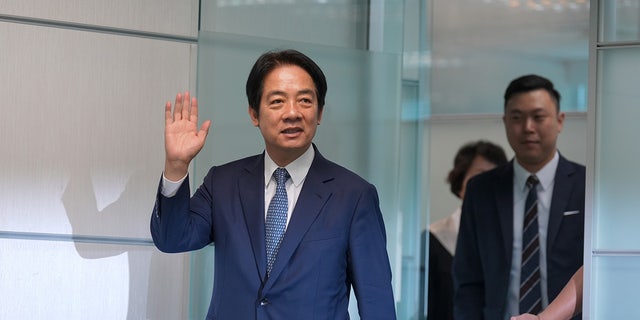 Taiwan vice president waves