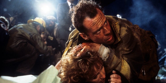 A scene from Die Hard with Bonnie Bedelia and Bruce Willis