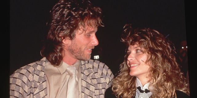 A photo of Peter Horton and Michelle Pfeiffer