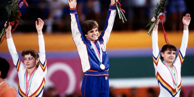 Mary Lou Retton atop the podium at the 1984 Olympic games