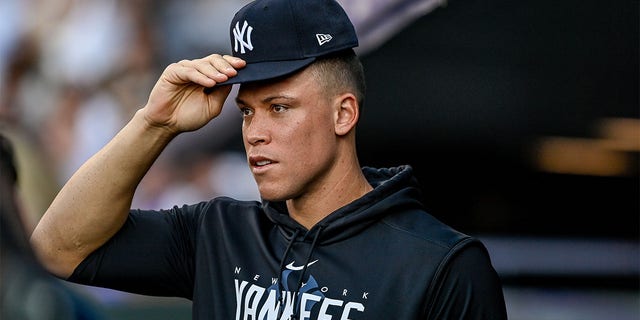 Aaron Judge watches from the dugout