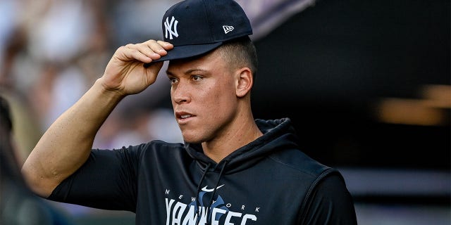 Aaron Judge watches from the dugout