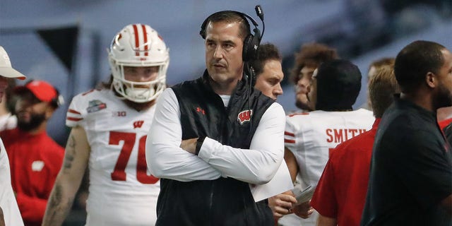 Luke Fickell looks on during the Wisconsin bowl game
