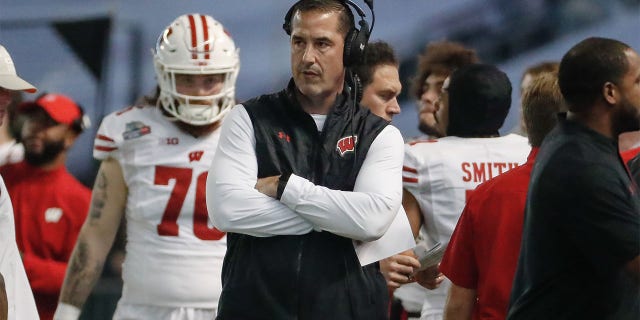 Luke Fickell looks on during the Wisconsin bowl game