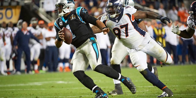 Malik Jackson chases Cam Newton