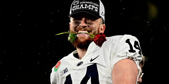 Penn State quarterback Sean Clifford celebrates a Rose Bowl win