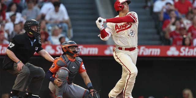 Shohei Ohtani hits a home run against the Astros