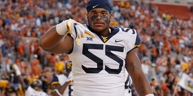 Dante Stills flashes the "Horns Down" gesture