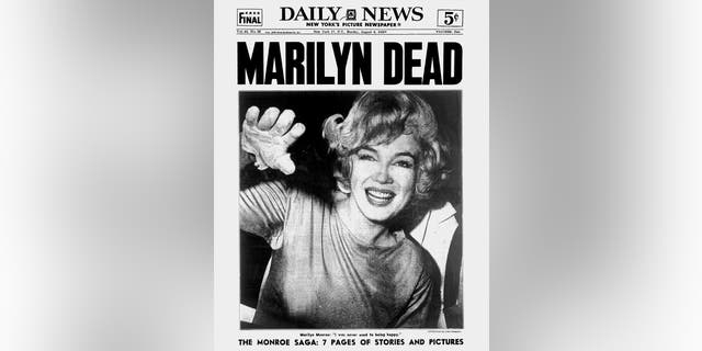 a close-up of a newspaper announcing Marilyn Monroes death