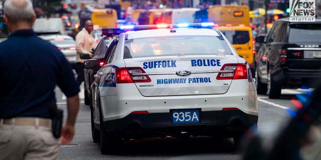 Suffolk Highway Patrol remains parked outside of 385 Fifth Avenue