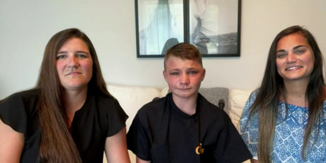 Luke Combs surprises hospitalized teen with concert tickets.