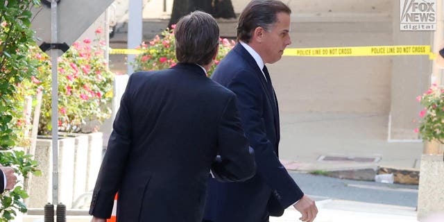 Hunter Biden walks into Federal court dressed in a suit